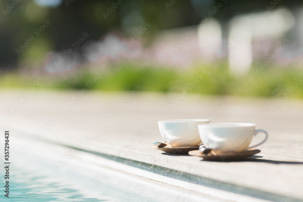 Cappuccino cups at poolside