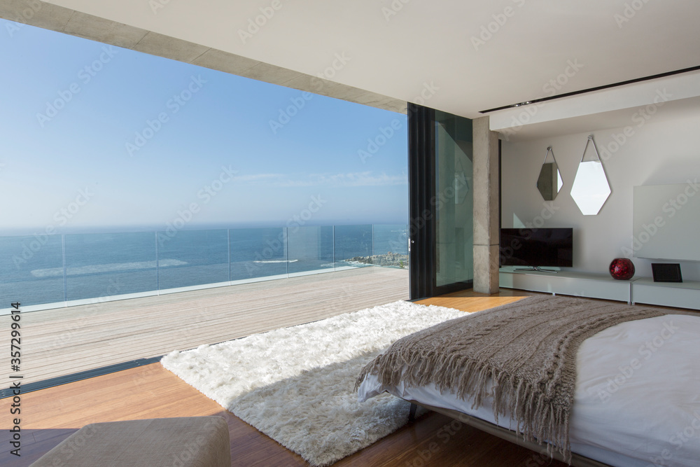 Modern bedroom overlooking ocean