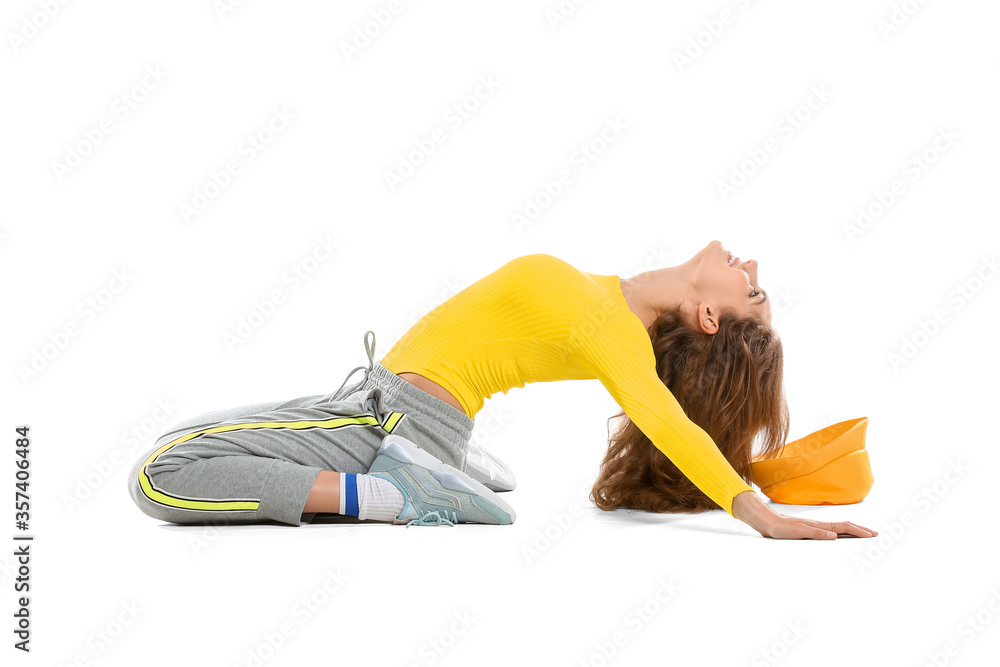 Beautiful female hip-hop dancer isolated on white