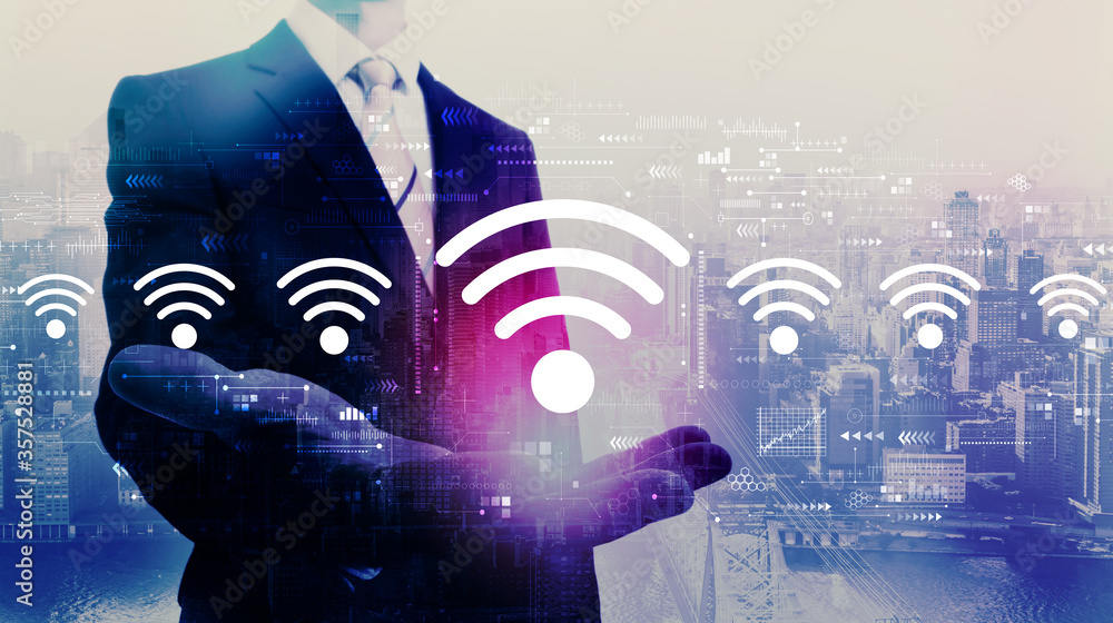 Wifi theme with businessman on a city background