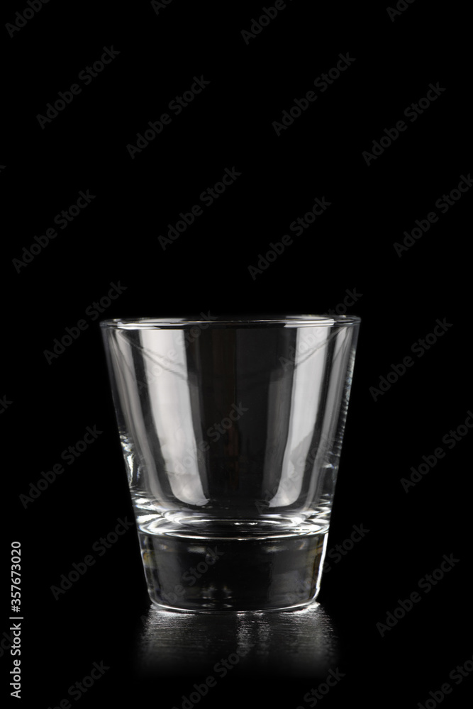 Glass for alcoholic drinks on black