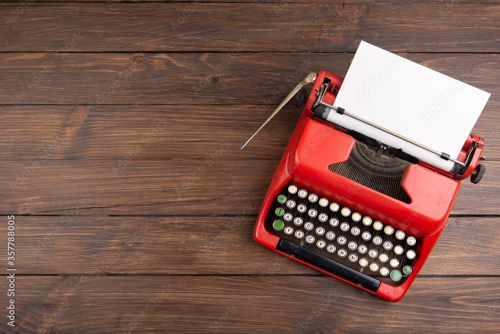 Vintage typewriter and a blank sheet of paper,Writer or journalist workplace