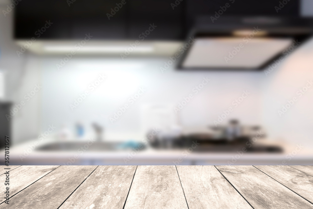 White wooden table in a small kitchen