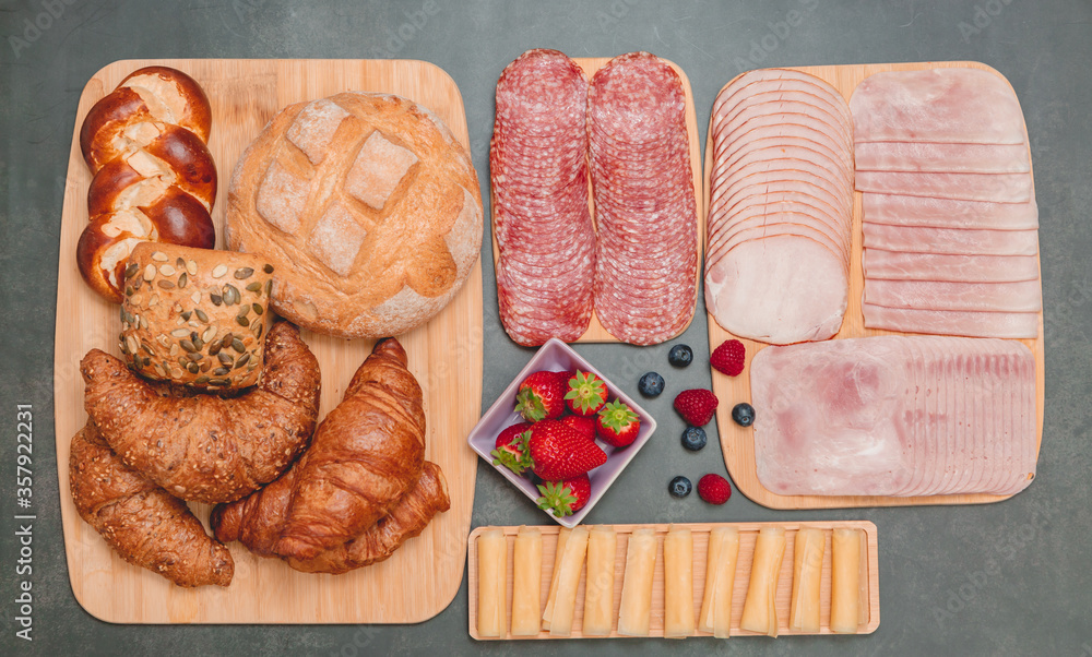 Breakfast served in the morning on the table with Croissant bread, Croissant cereal, Bacon, ham, che