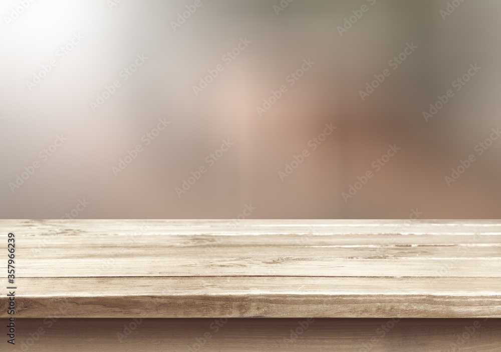 The wooden empty table top on blur background