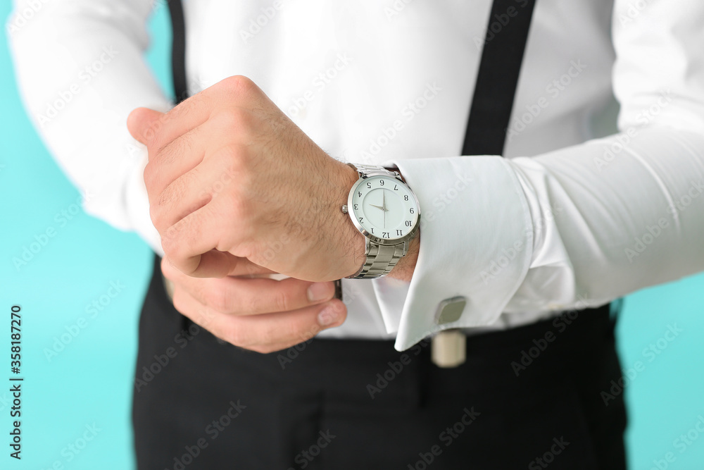 Young man in formal clothes on color background, closeup