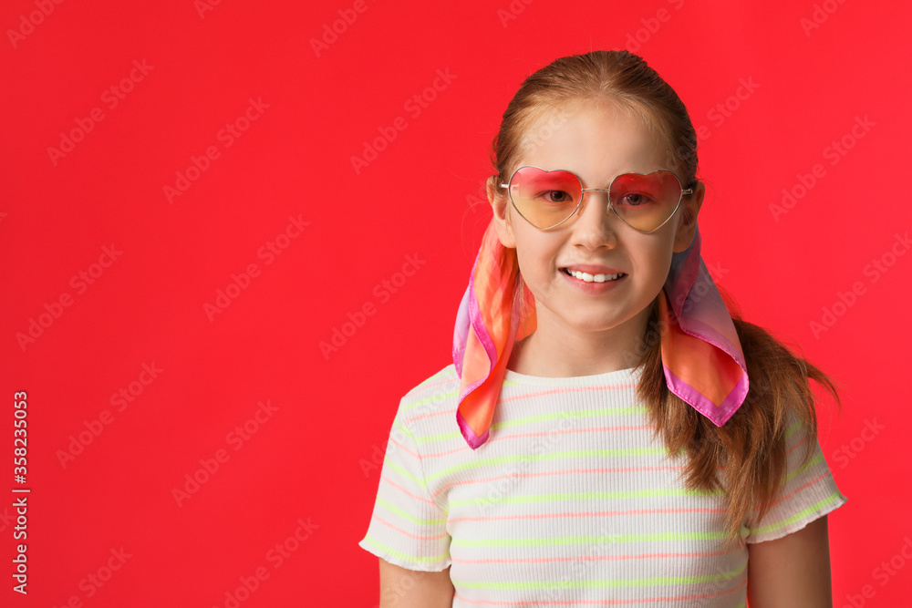 Cute redhead girl on color background