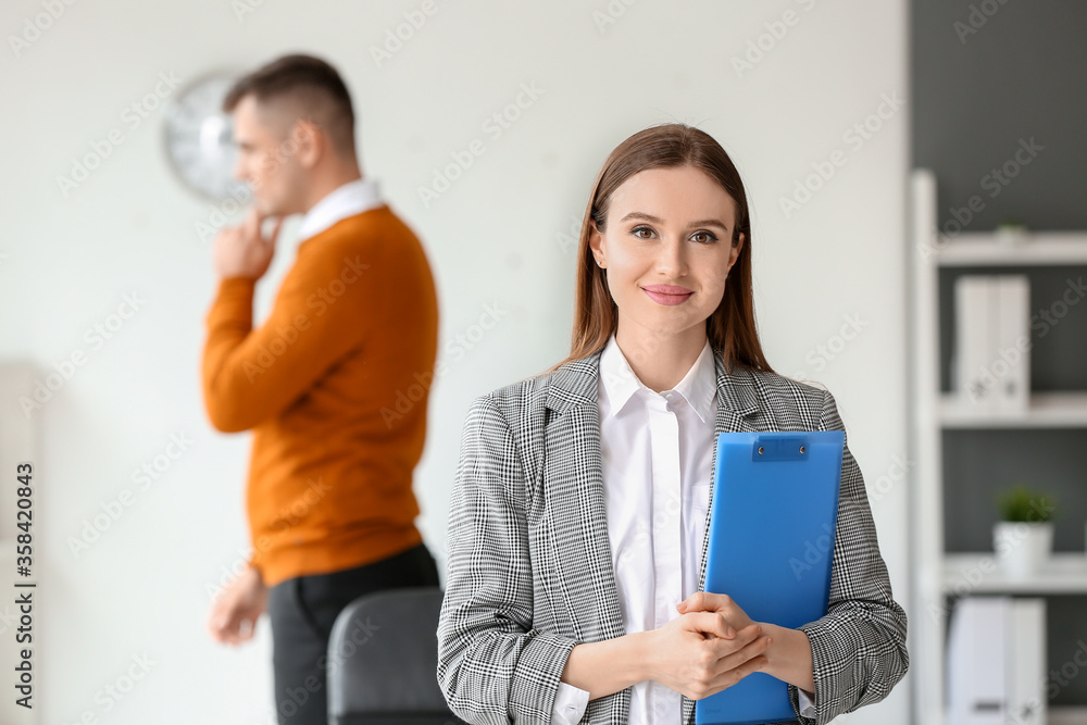 Young businesswoman working in office