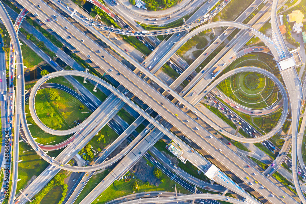 Aerial view footage of car traffic of expressway and intersection in urban. concept or infrastructur