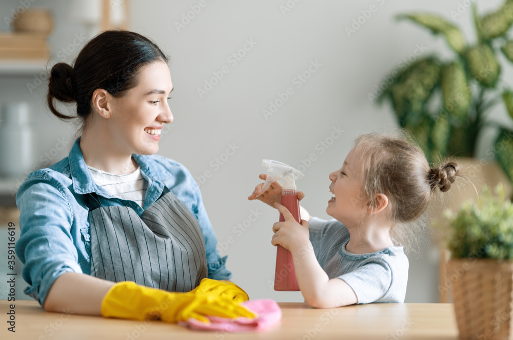 family cleaning the room