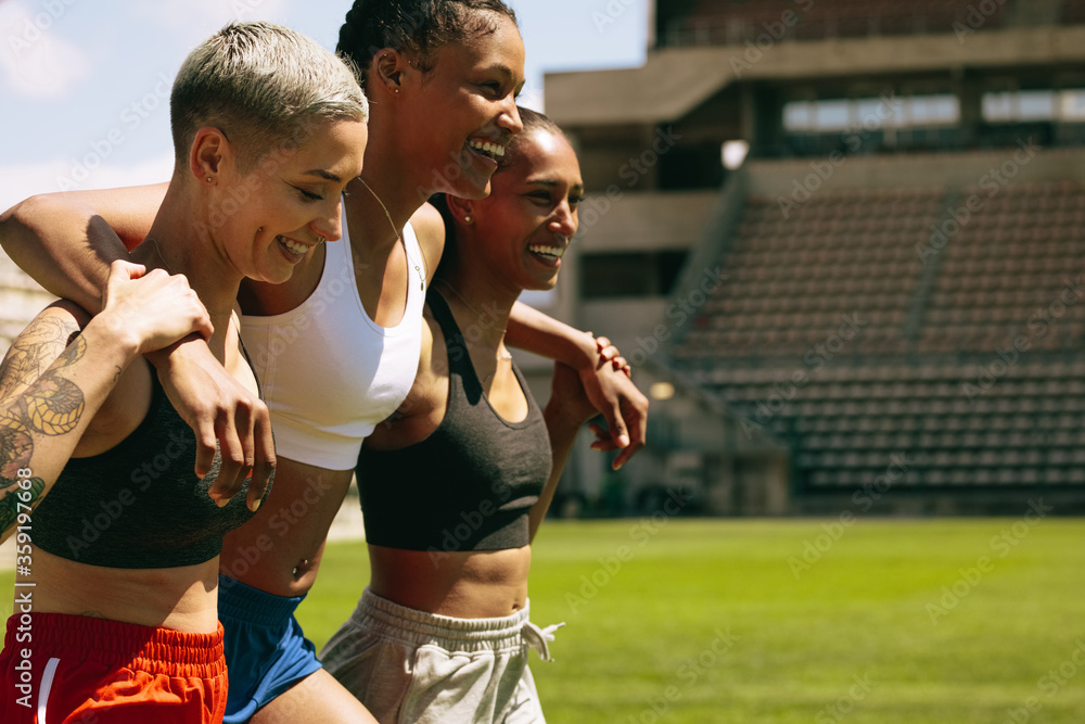 Female athletes after training session at sports field