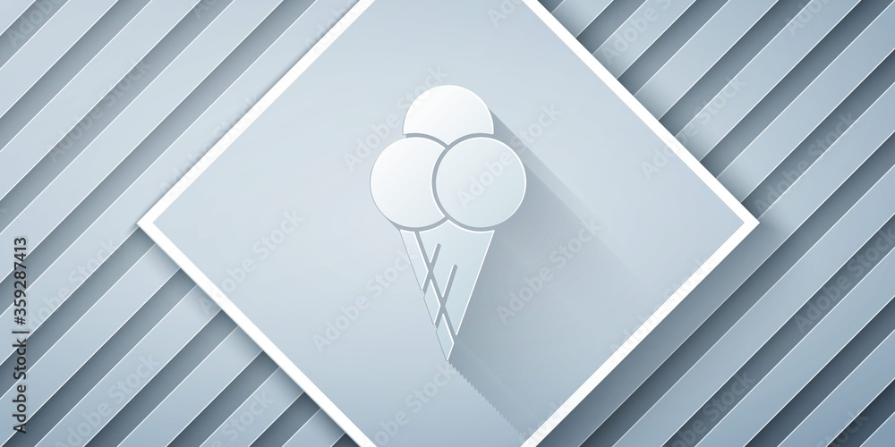 Paper cut Ice cream in waffle cone icon isolated on grey background. Sweet symbol. Paper art style. 