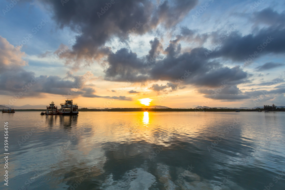 Beautiful sunset over the bay of Andaman Sea in Thailand