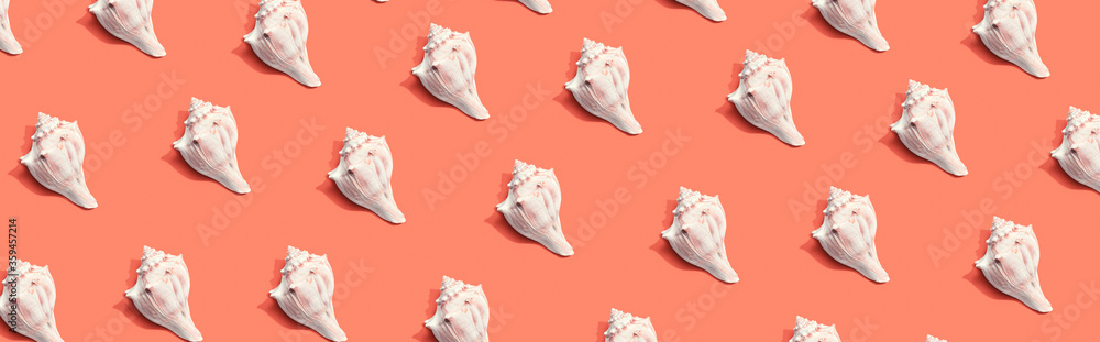 Summer concept with seashells overhead view - flat lay