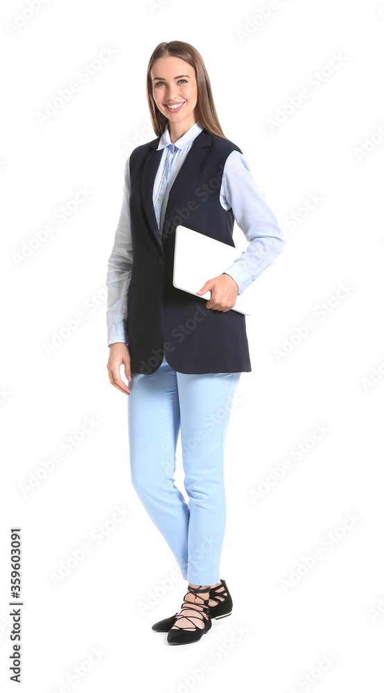 Beautiful young businesswoman with laptop on white background