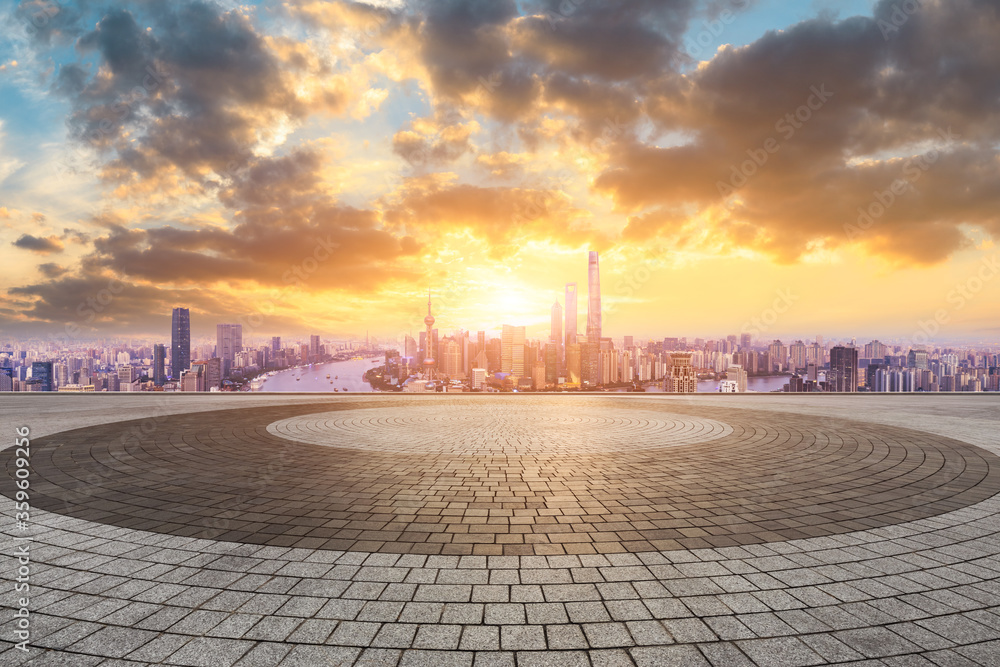 Empty square floor and Shanghai skyline with buildings at sunset,China.High angle view.