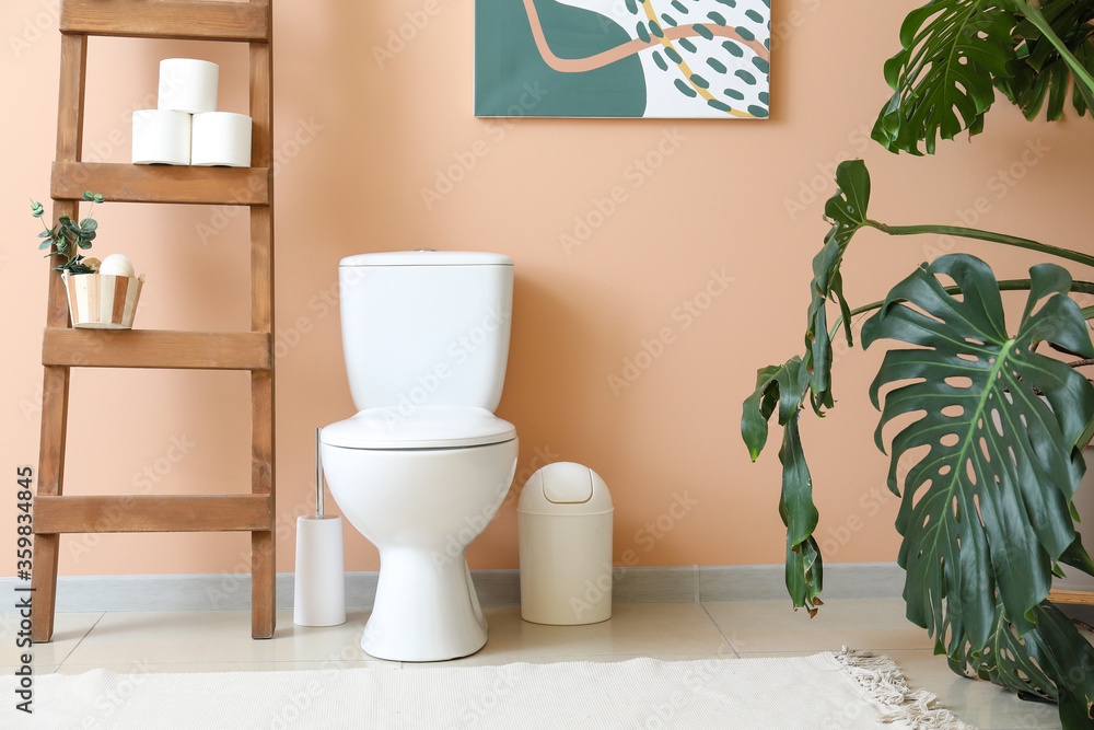 Modern toilet bowl in interior of restroom