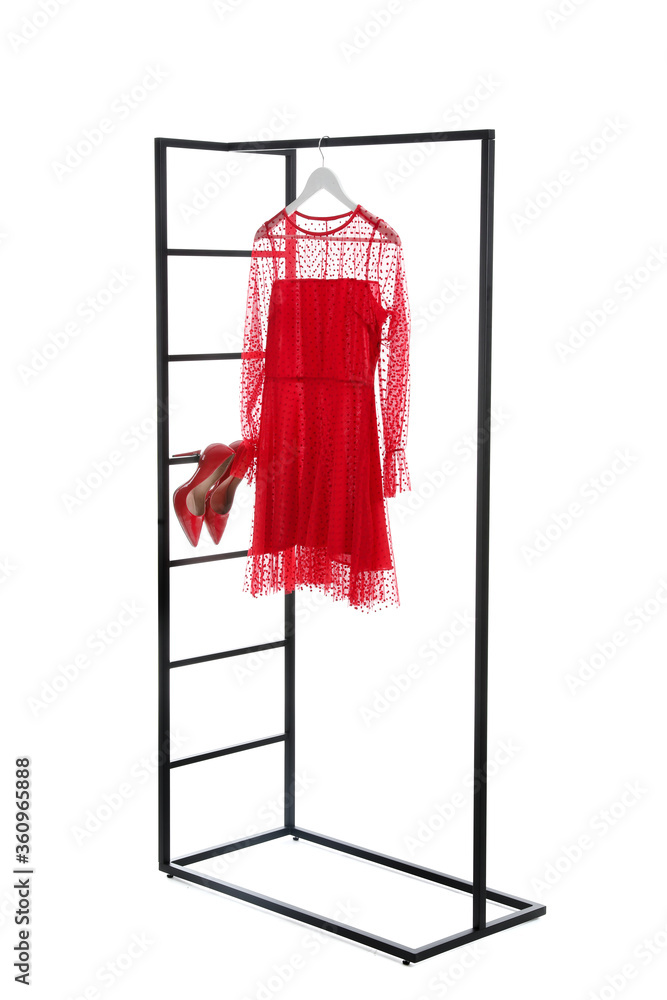 Stylish hanger with female clothes on white background