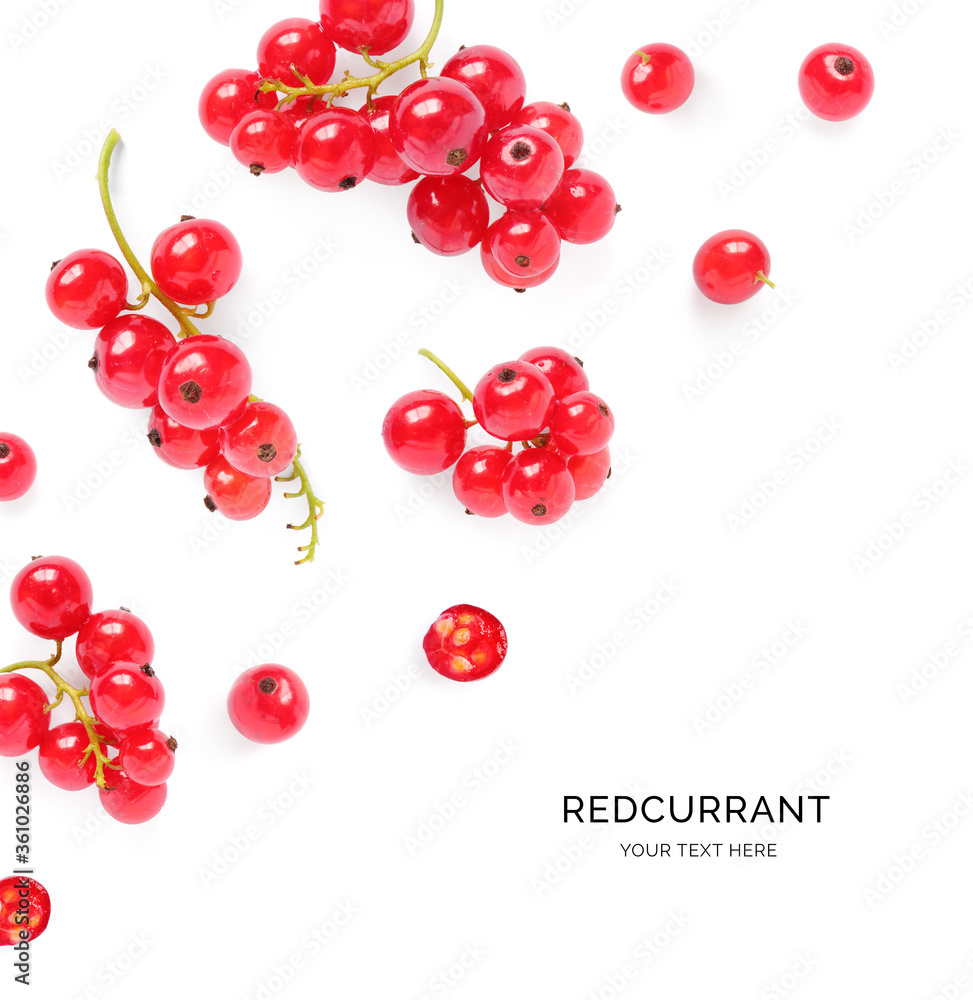 Creative layout made of red currant on the white background. Flat lay. Food concept.