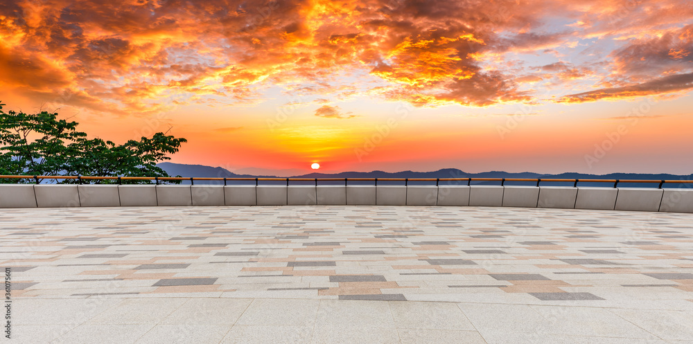 Empty floor and mountain with beautiful sky clouds at sunset in Hangzhou.