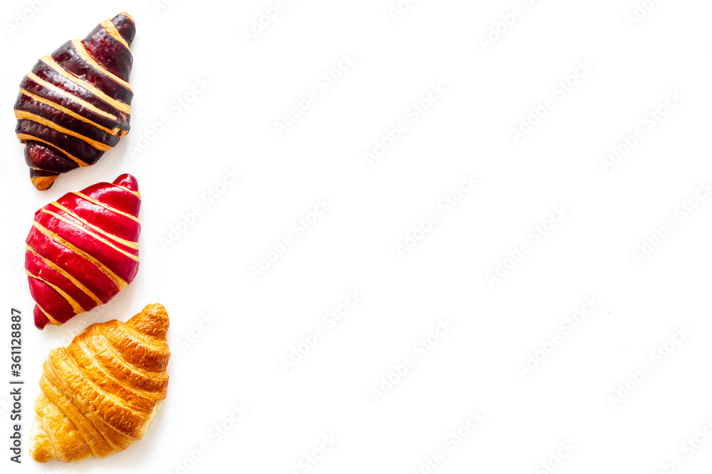 Frame of croissants - fresh bakery on white background