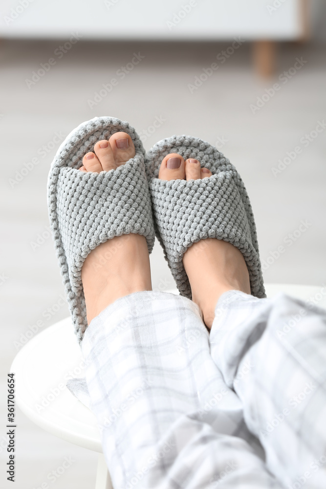 Woman in soft slippers at home