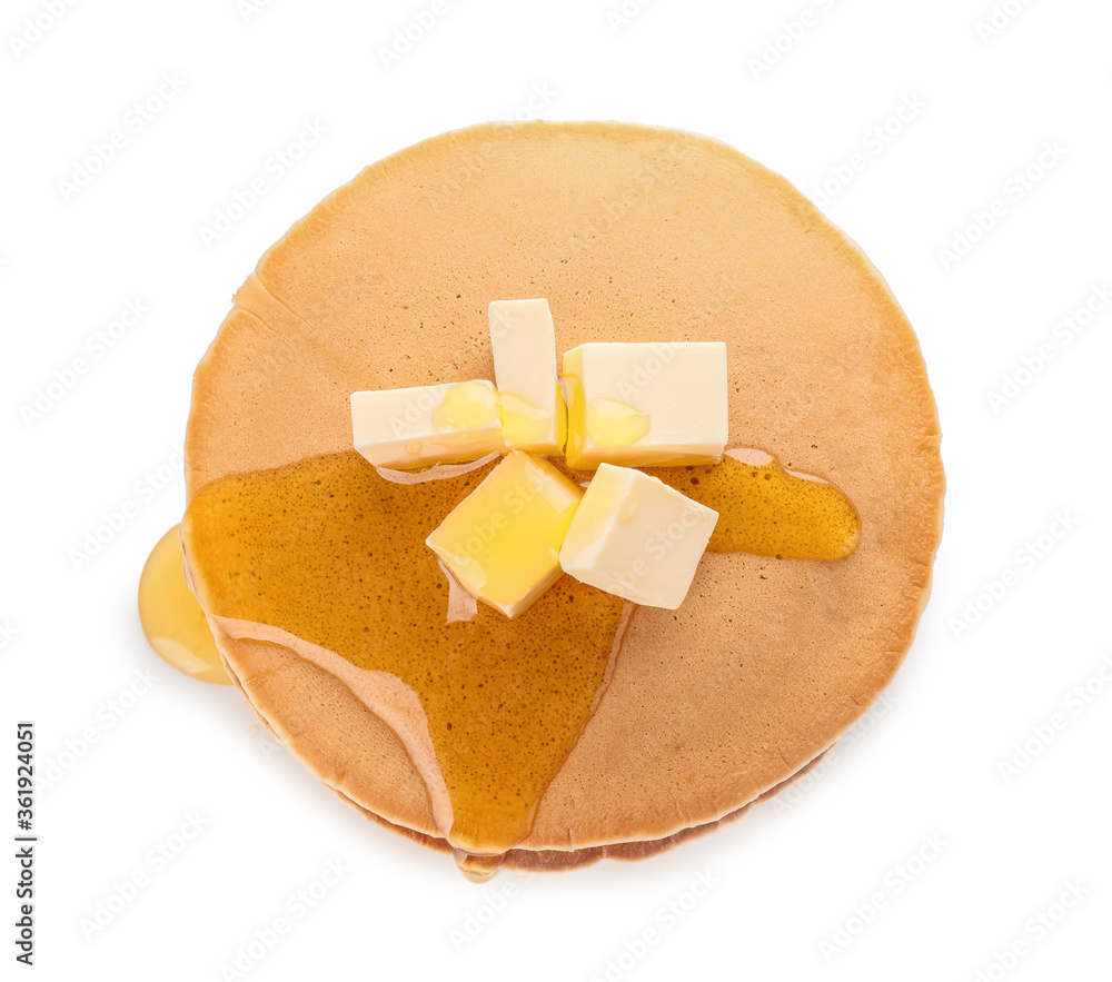 Tasty pancakes with honey and butter on white background