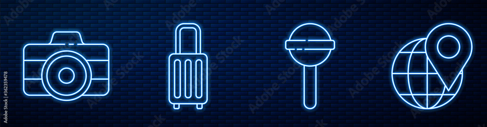 在地球上设置棒棒糖、相机、手提箱和位置。砖墙上闪烁的霓虹灯图标