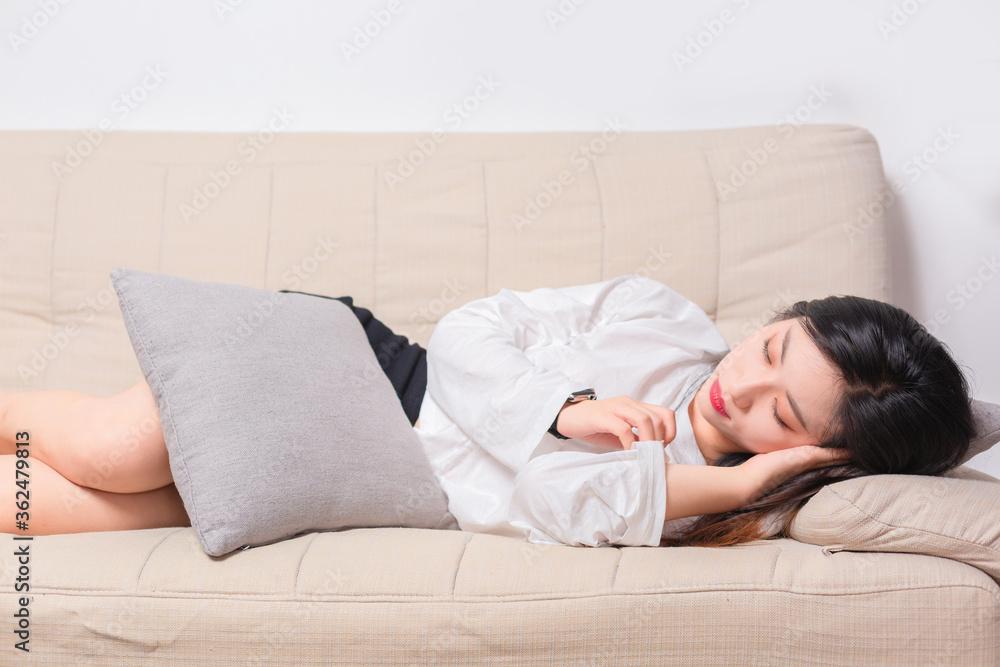 Asian beauty sleeping on the sofa

