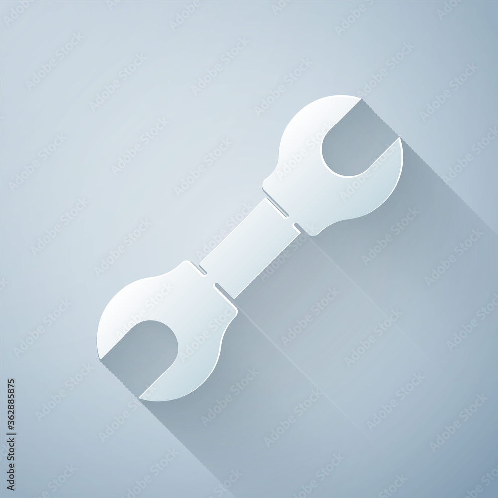 Paper cut Wrench spanner icon isolated on grey background. Paper art style. Vector Illustration.