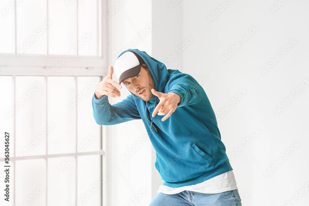 Male hip-hop dancer in studio