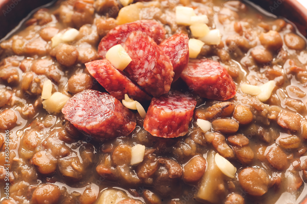 Bowl of tasty lentils soup, closeup