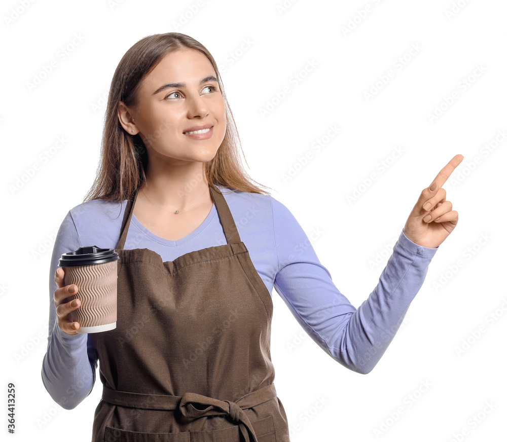 Female barista pointing at something on white background