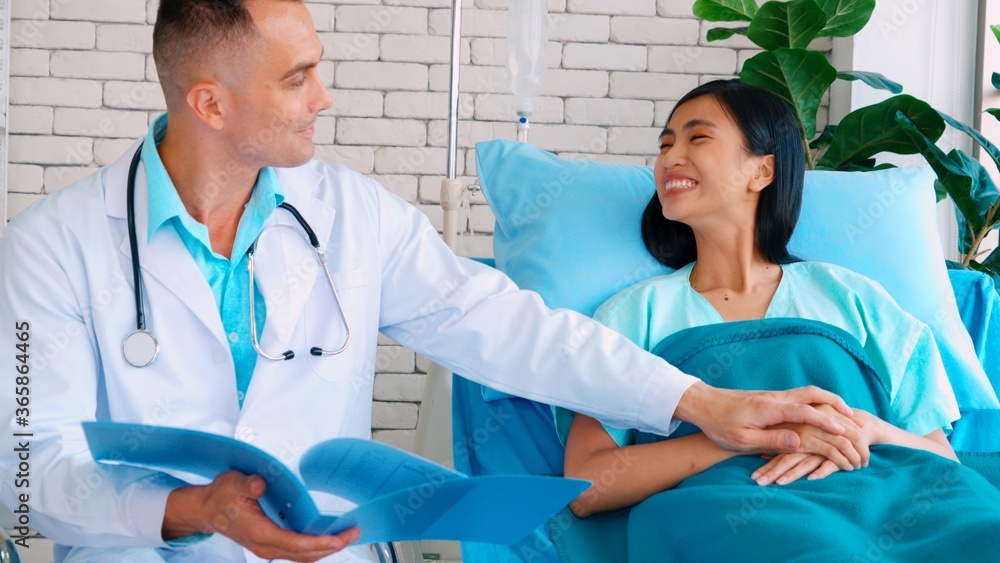 Doctor in professional uniform examining patient at hospital or medical clinic. Health care , medica