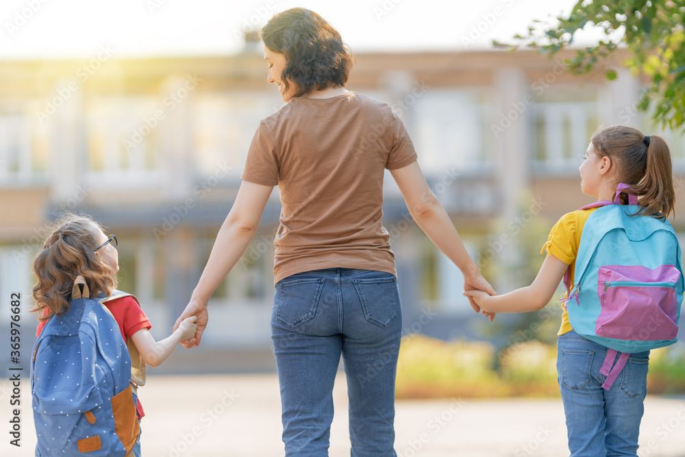 Parent and pupils go to school