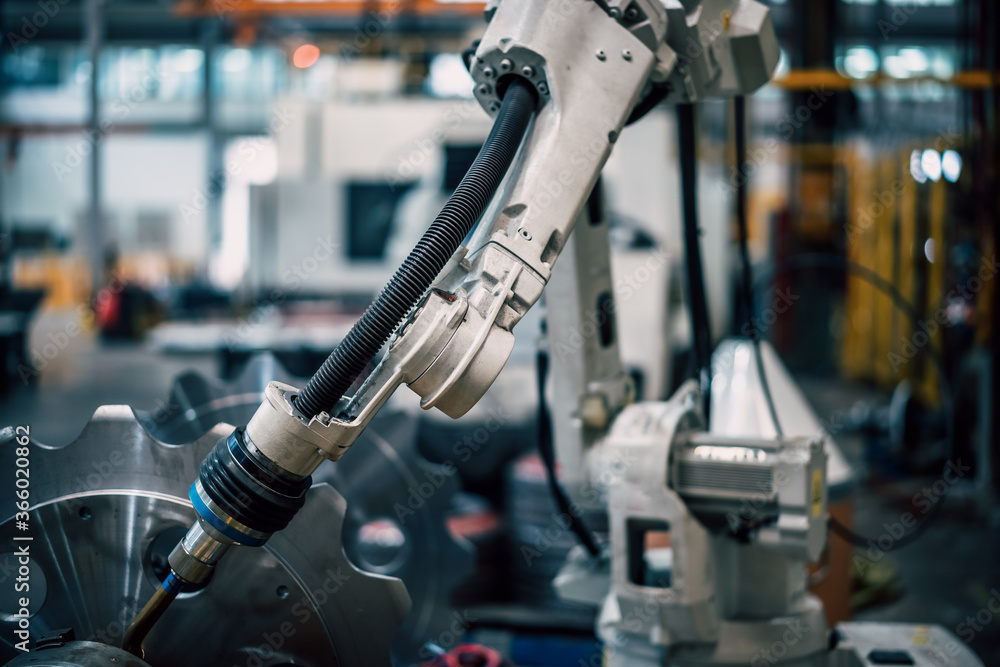 robot arm working in factory