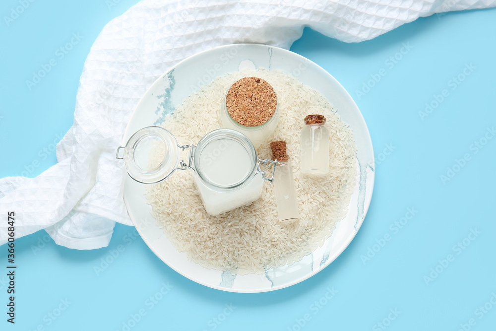 Healthy rice water on color background