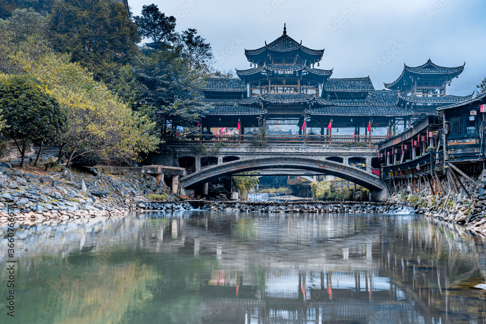 Early morning wind and rain bridge in Qianhu Miao Village, Xijiang, Guizhou, China