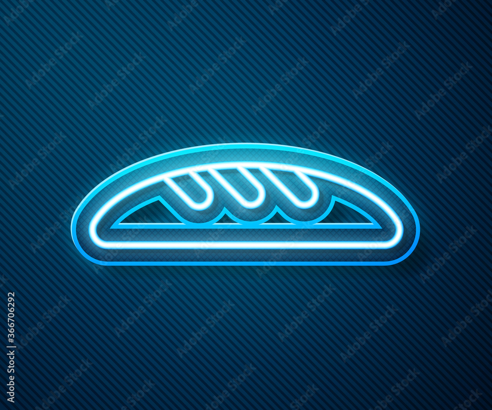 Glowing neon line Bread loaf icon isolated on blue background. Vector Illustration.