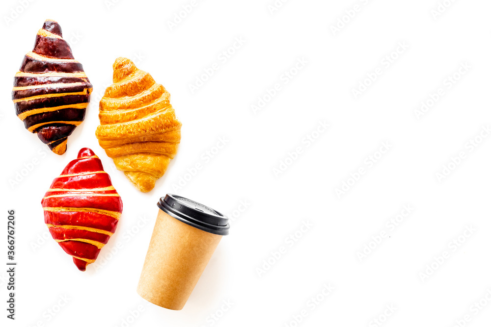 Set of coffee with croissants - chocolate, berry, classic - on white top view