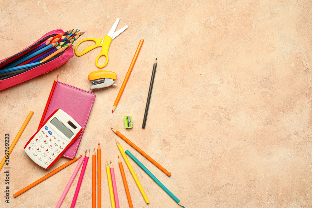 Ordinary pencils with stationery on color background