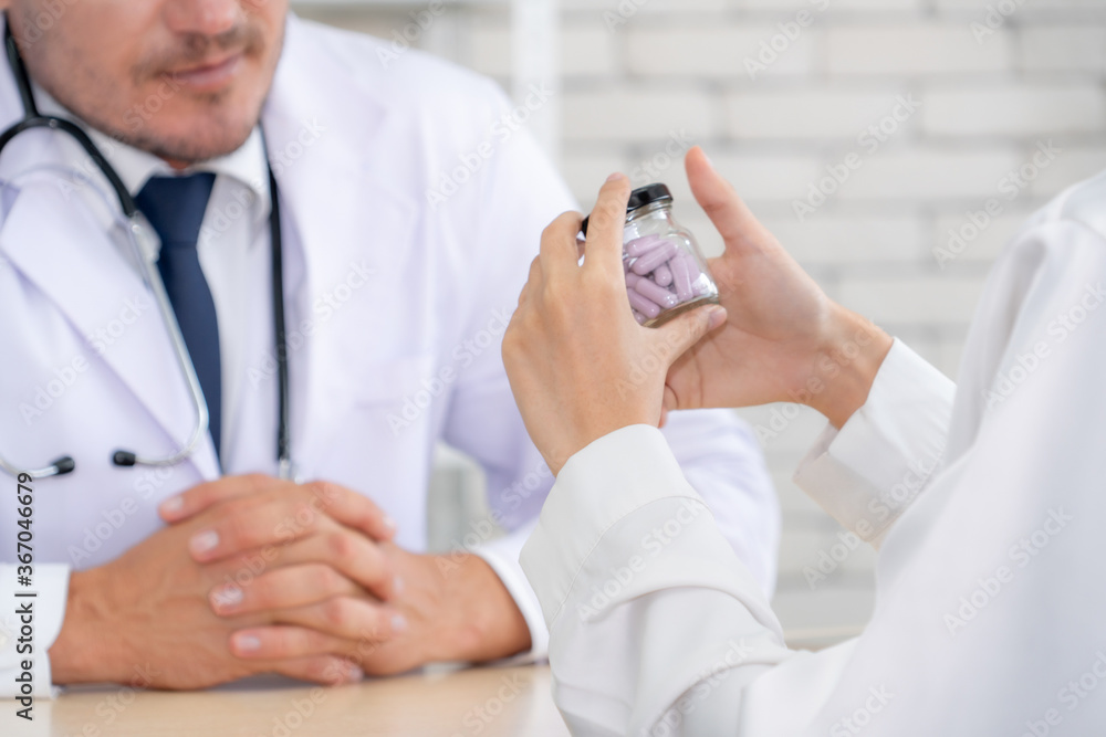 Doctor in professional uniform examining patient at hospital or medical clinic. Health care , medica