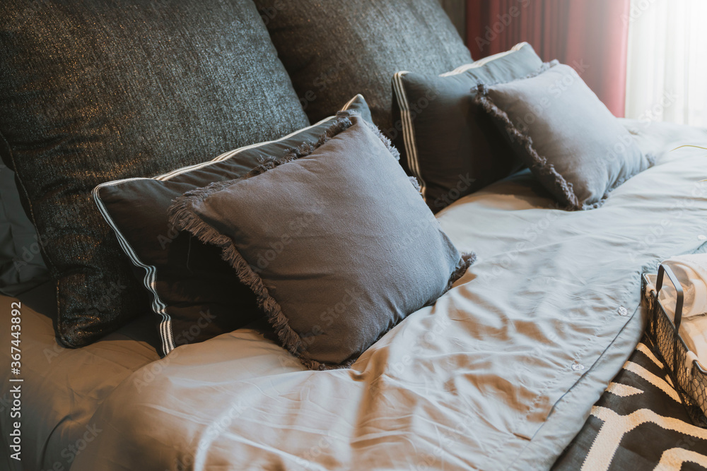 close up white beige soft pillows on bed and blanket bedroom interior design concept.bed maid luxury