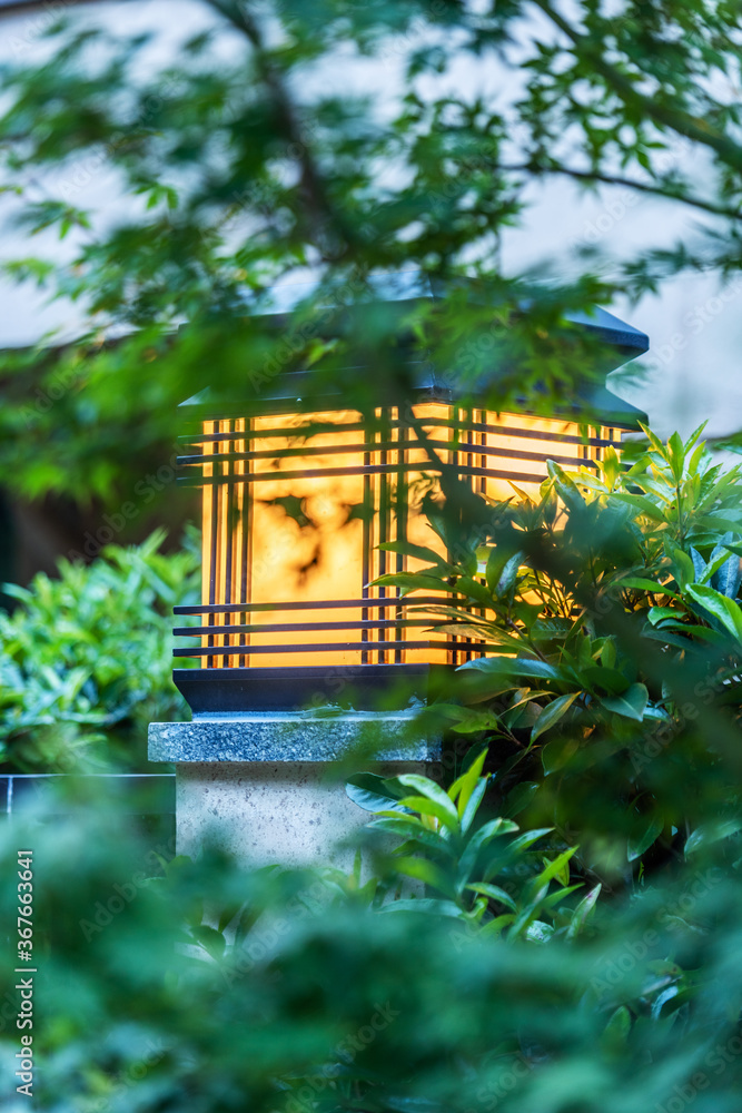 Lighting lamp on the pillar in the villa garden。