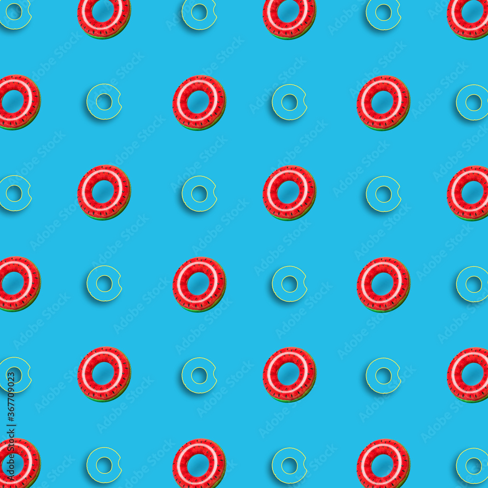 Many inflatable rings on color background