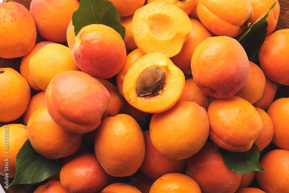 Tasty ripe apricots as background