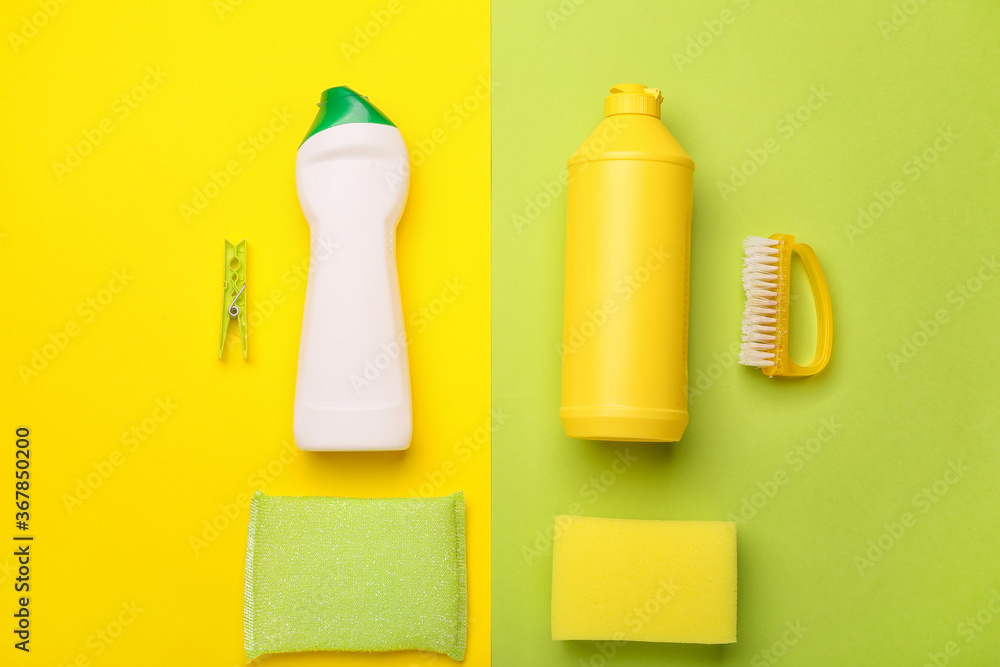 Set of cleaning supplies on color background