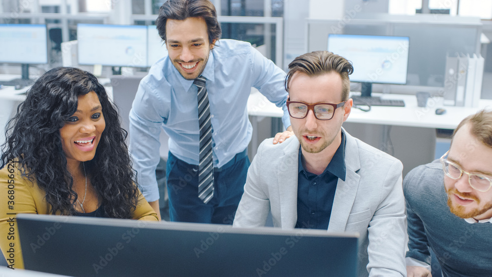 In Modern Office: Diverse Team of Young Motivated Businessmen and Businesswoman Work on Computer, Ha