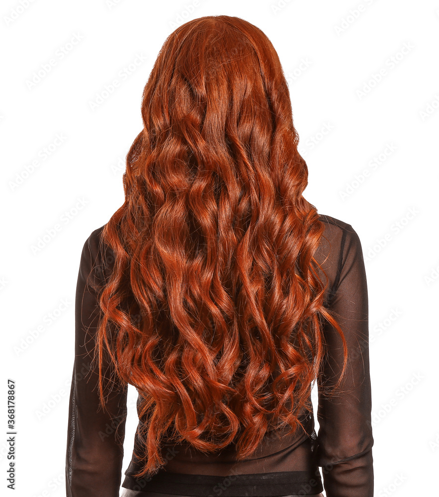 Beautiful young redhead woman on white background, back view