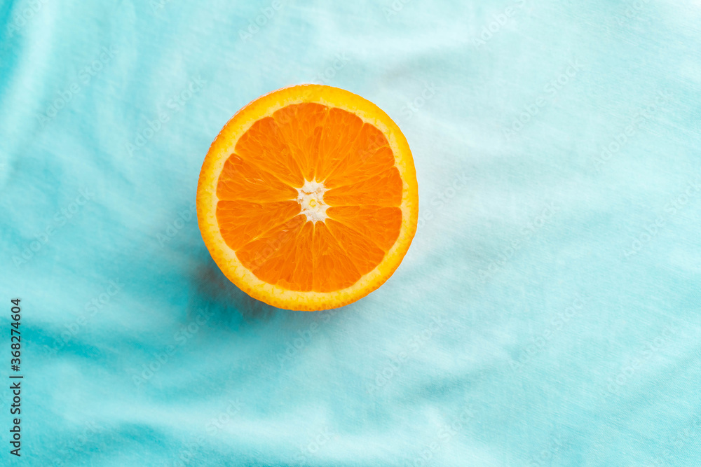 orange on the blue sky cloth